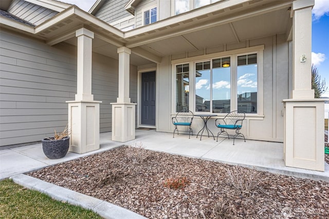 doorway to property with a porch