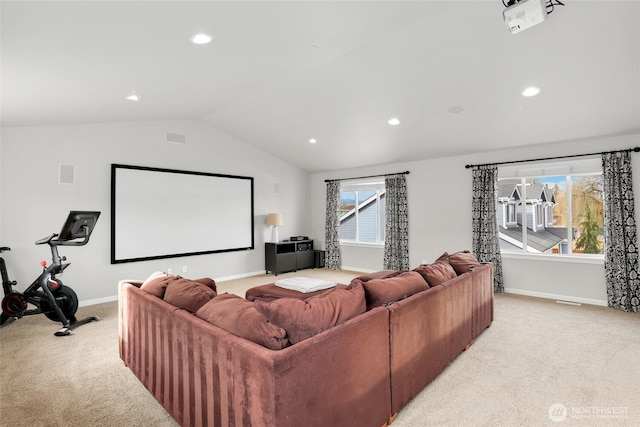 home theater featuring light carpet, visible vents, baseboards, vaulted ceiling, and recessed lighting