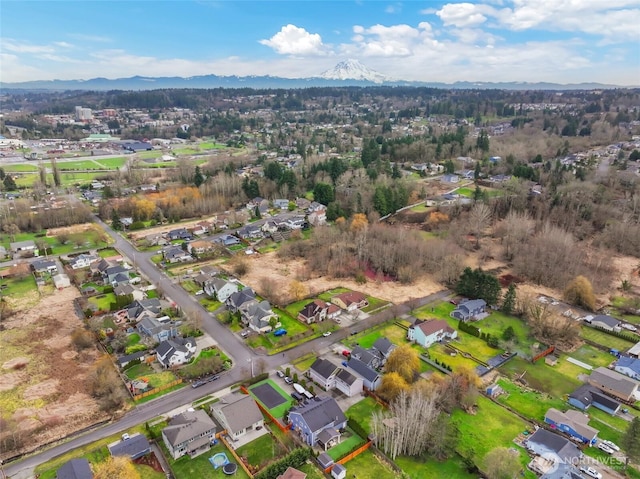 aerial view featuring a residential view and a mountain view