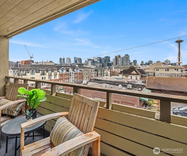 balcony featuring a view of city