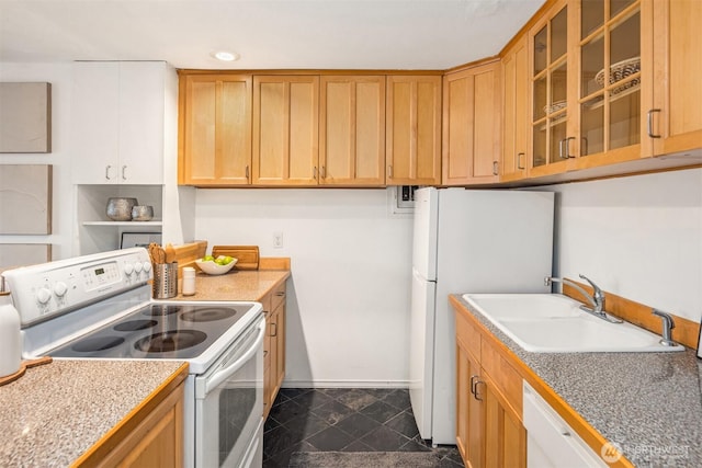 kitchen with glass insert cabinets, white appliances, brown cabinets, and a sink