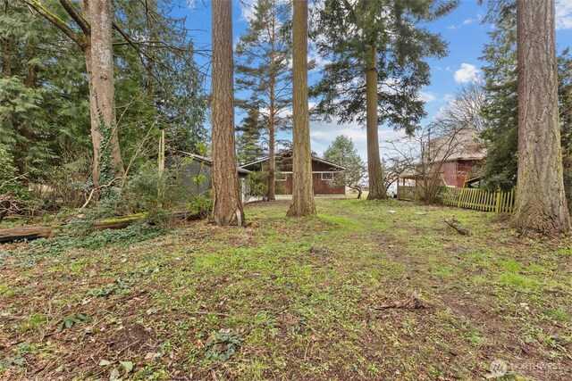 view of yard featuring fence