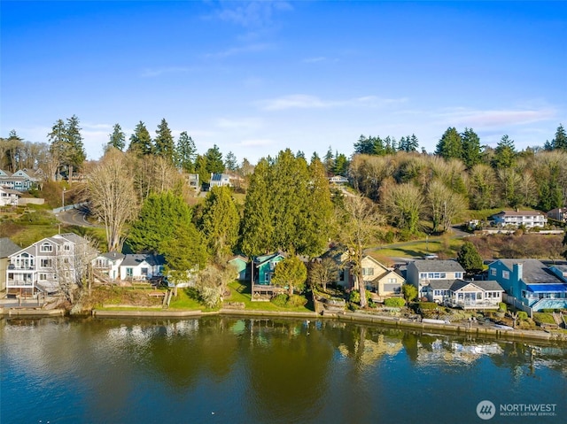 aerial view featuring a water view and a residential view