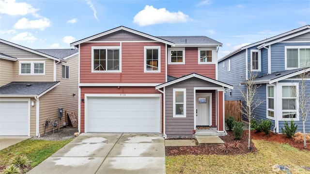 view of front of house featuring driveway and an attached garage