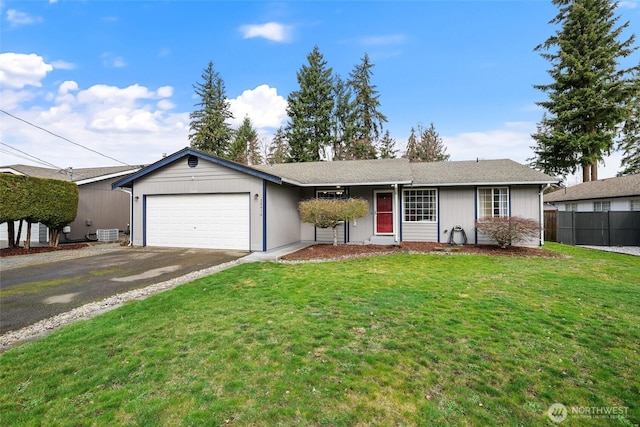 ranch-style house featuring cooling unit, fence, driveway, an attached garage, and a front lawn