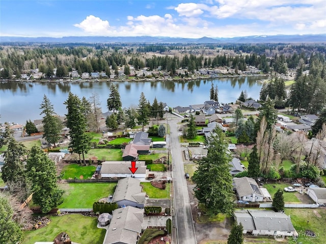 aerial view featuring a residential view and a water view