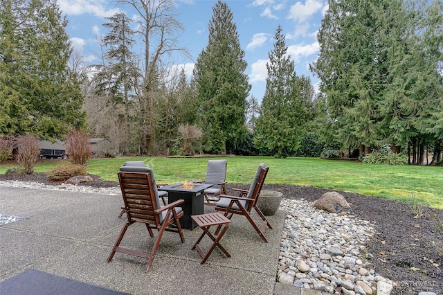 view of patio with an outdoor fire pit