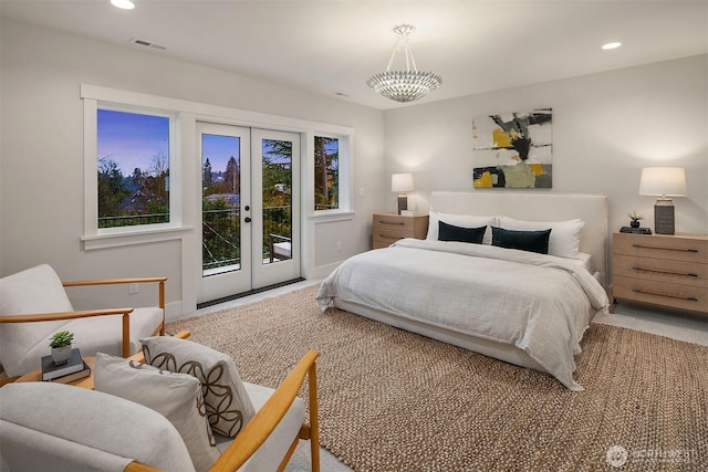 bedroom with access to exterior, recessed lighting, visible vents, and french doors