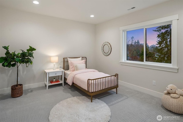 bedroom featuring light colored carpet, visible vents, baseboards, and recessed lighting