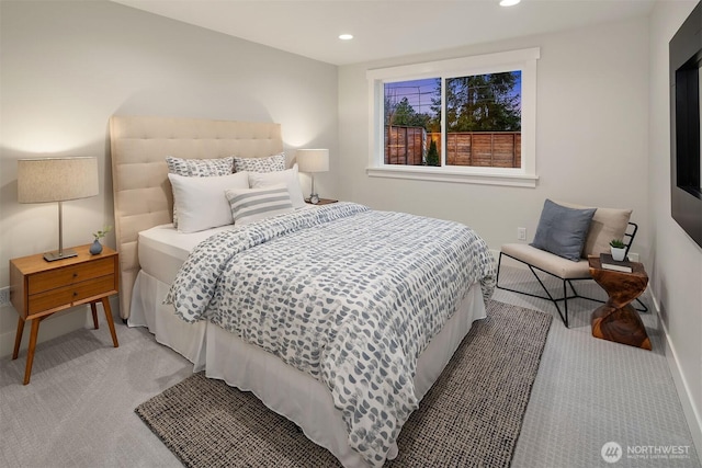 bedroom featuring light carpet, baseboards, and recessed lighting