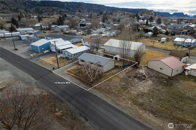 aerial view featuring a residential view and a mountain view