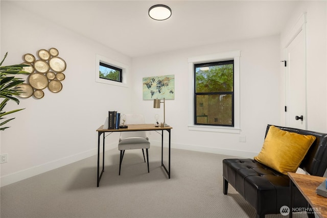 home office featuring baseboards and carpet flooring