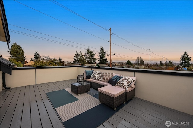 wooden deck featuring outdoor lounge area