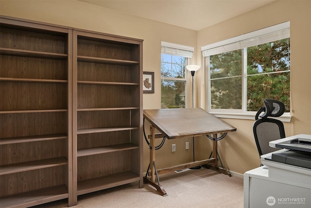 office with carpet flooring and baseboards