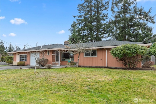 ranch-style house featuring a garage, a chimney, board and batten siding, and a front yard