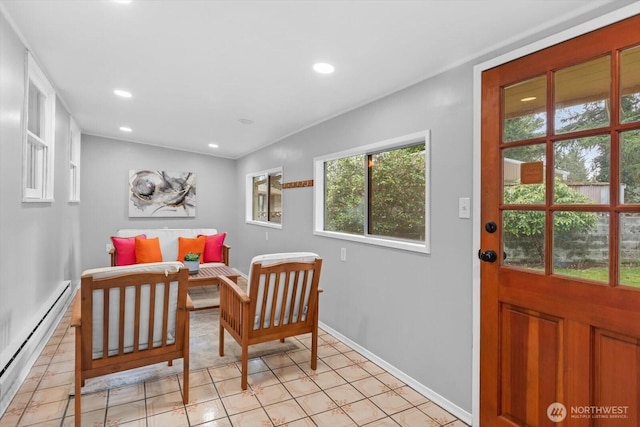 dining room featuring recessed lighting, a baseboard heating unit, and baseboards