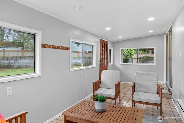 living area with light tile patterned floors, baseboards, and recessed lighting