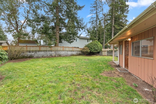 view of yard featuring fence