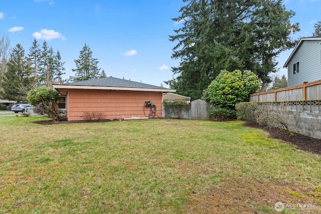 view of yard with fence