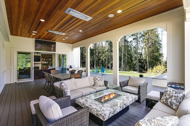 sunroom with wooden ceiling and visible vents