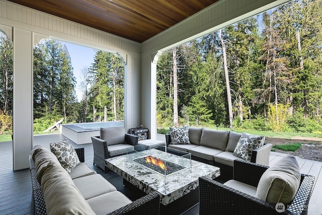 sunroom / solarium with wood ceiling