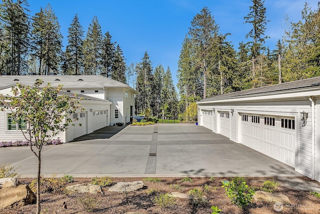 view of side of property featuring a garage