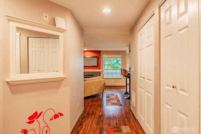 hallway with dark wood-style floors