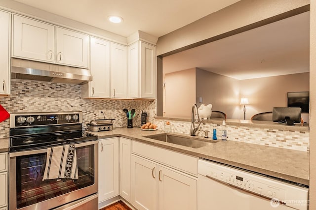 kitchen with white dishwasher, under cabinet range hood, a sink, stainless steel electric range oven, and tasteful backsplash