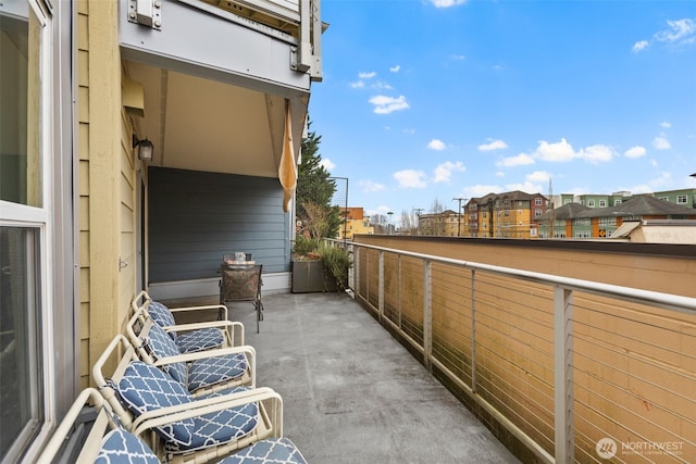 balcony featuring a residential view