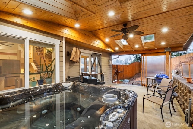 view of patio with a fenced backyard and ceiling fan