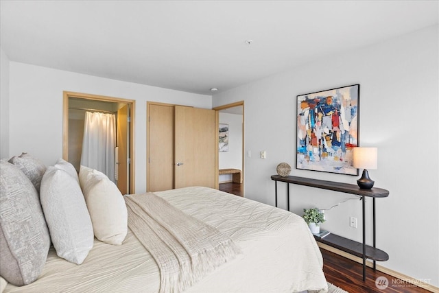 bedroom with a closet and wood finished floors