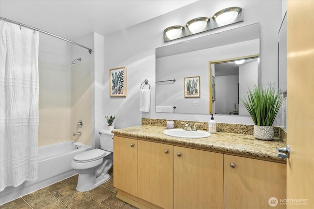 bathroom featuring toilet, shower / tub combo, tile patterned flooring, and vanity