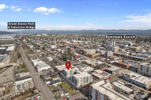 aerial view with a view of city and a mountain view