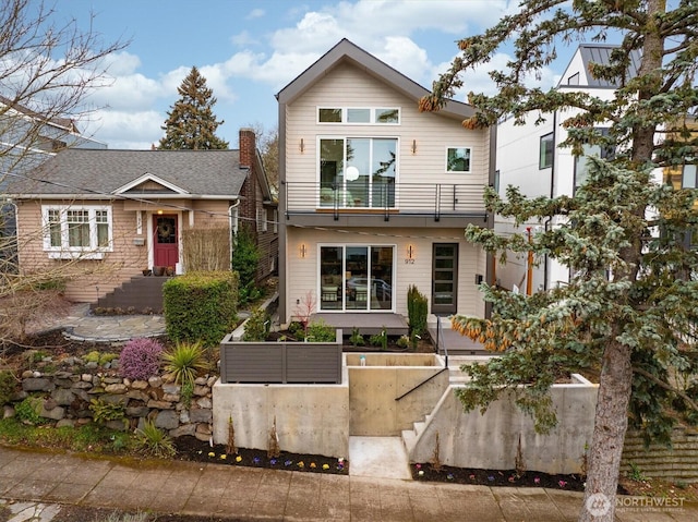 contemporary home featuring a balcony