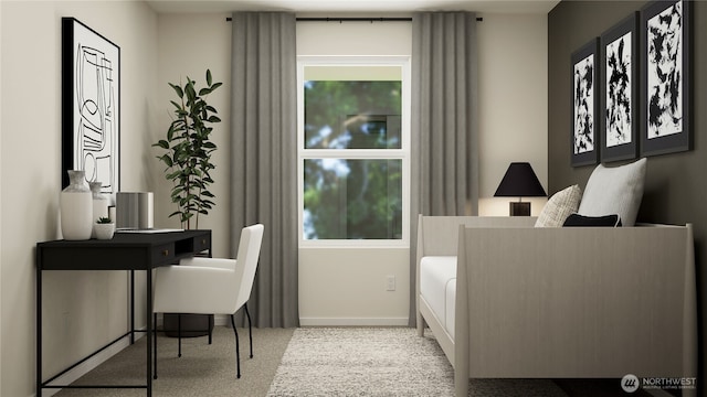 bedroom with light colored carpet, baseboards, and multiple windows