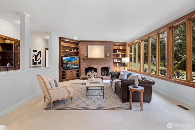 living room featuring carpet floors, visible vents, baseboards, a brick fireplace, and crown molding