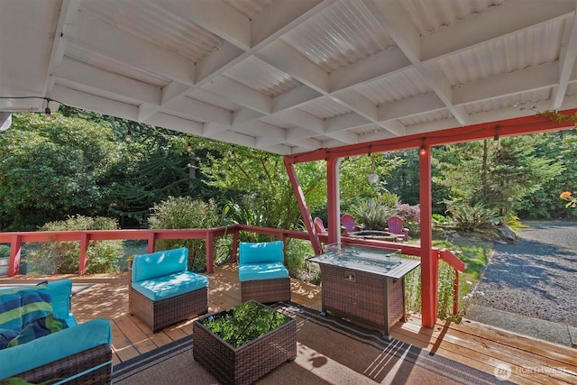 wooden deck featuring an outdoor living space