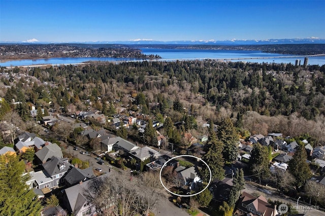 aerial view featuring a residential view and a water view