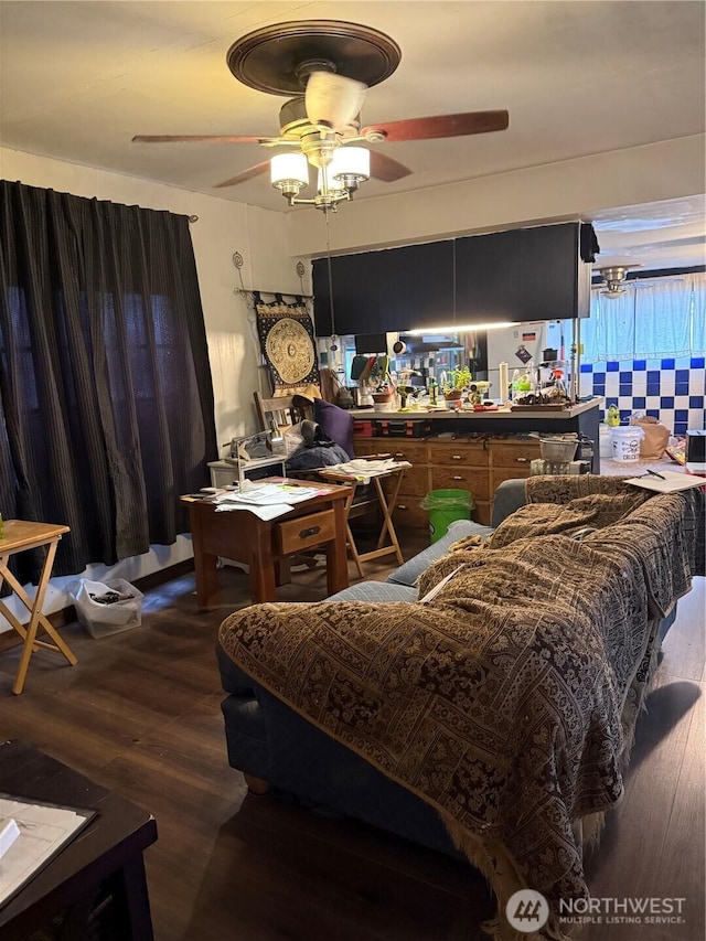 bedroom featuring dark wood-style floors and ceiling fan