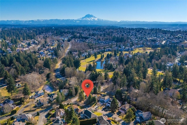 drone / aerial view with a mountain view and a residential view