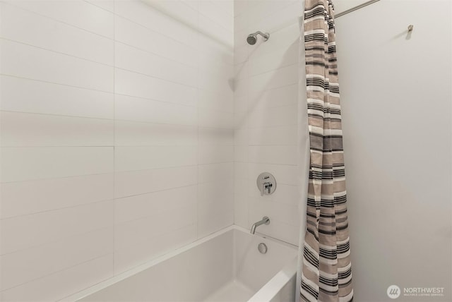 bathroom with shower / bath combination with curtain