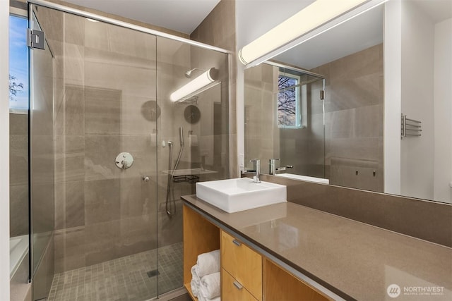 full bath featuring a shower stall and vanity