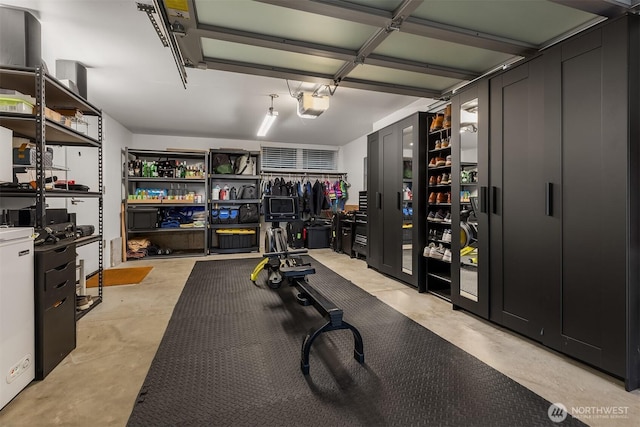 exercise room with a garage