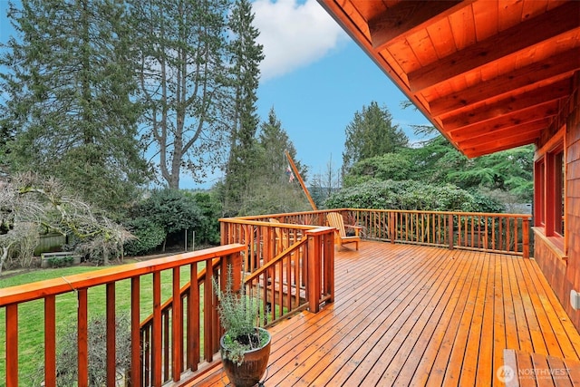 deck featuring a lawn