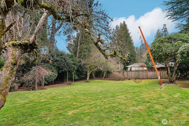 view of yard with fence