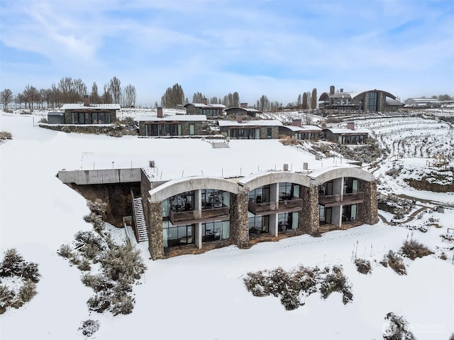 view of snow covered property