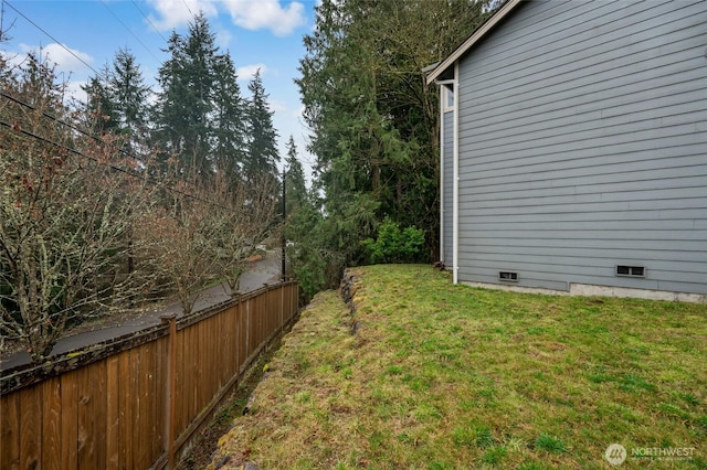 view of yard with fence