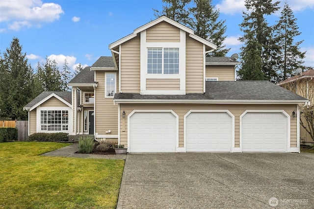 view of front of property with roof with shingles, concrete driveway, a front yard, fence, and a garage