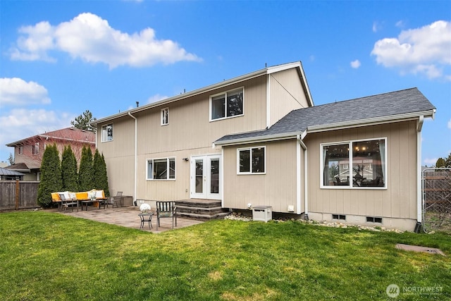 back of house with a yard, french doors, a patio area, and fence