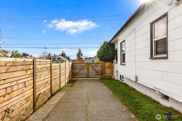 view of yard featuring a gate and fence